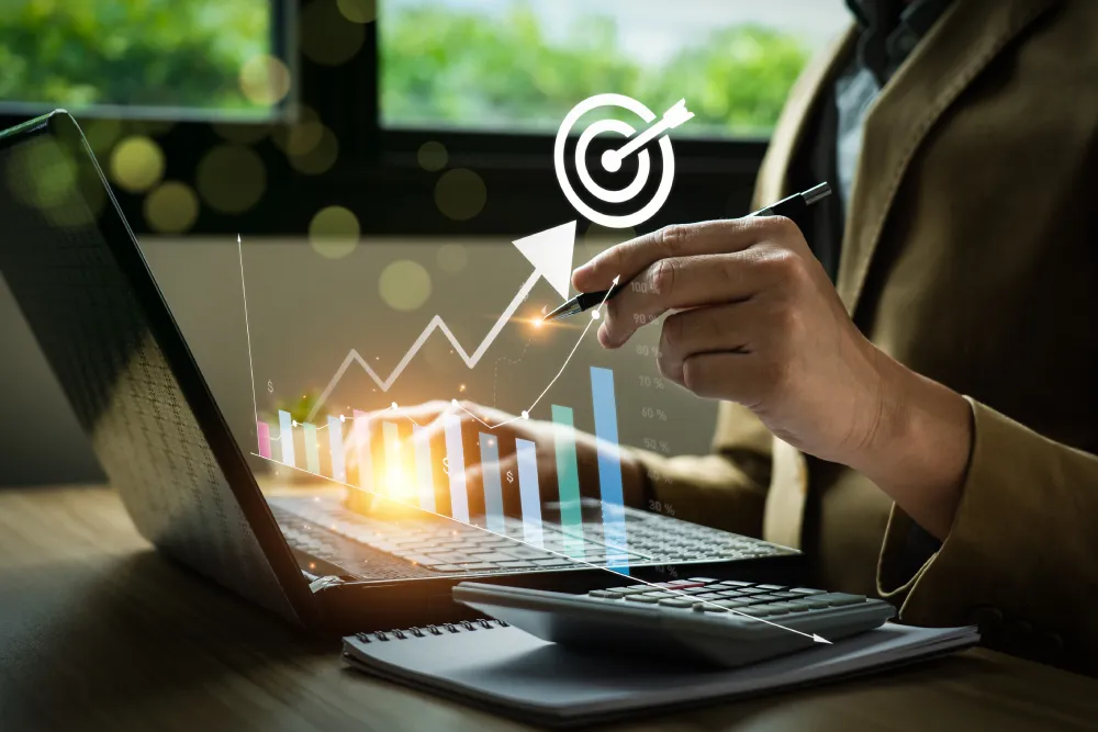 Growth, Sales & Marketing Business goals and marketing strategies. Businessman calculating business growth with arrow graph icon on laptop. economic, development, success, strategy, prospects, sustainable goals.