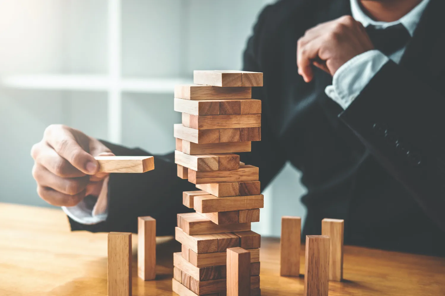 Strategy Development & Execution (1) Businessman plan and strategy in business Domino Effect Leadership Management Solution concept